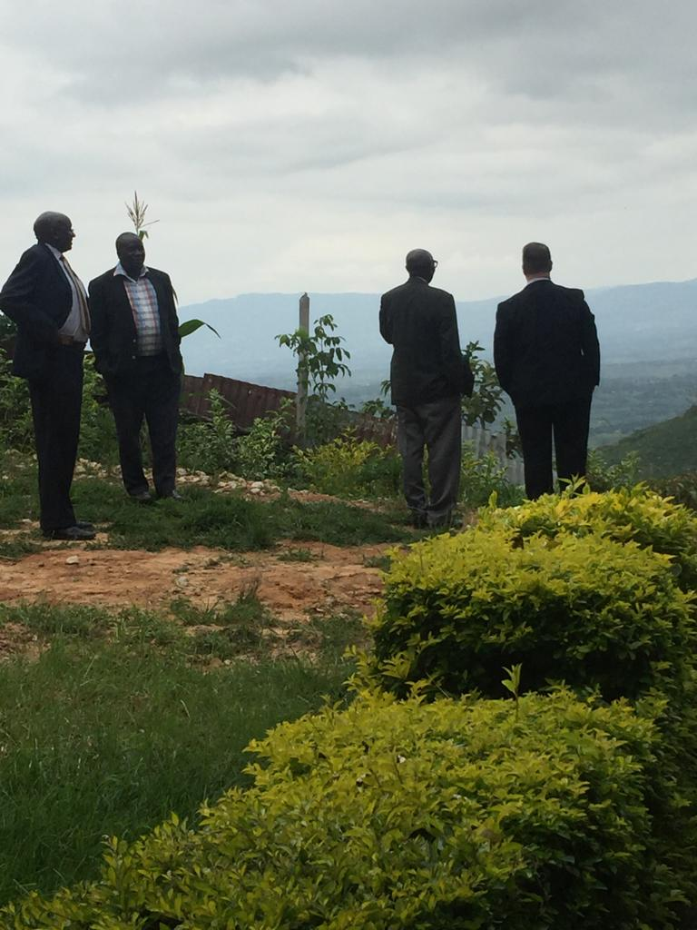 Men gather after AIC Church services Mikweni Village Kenya 2017