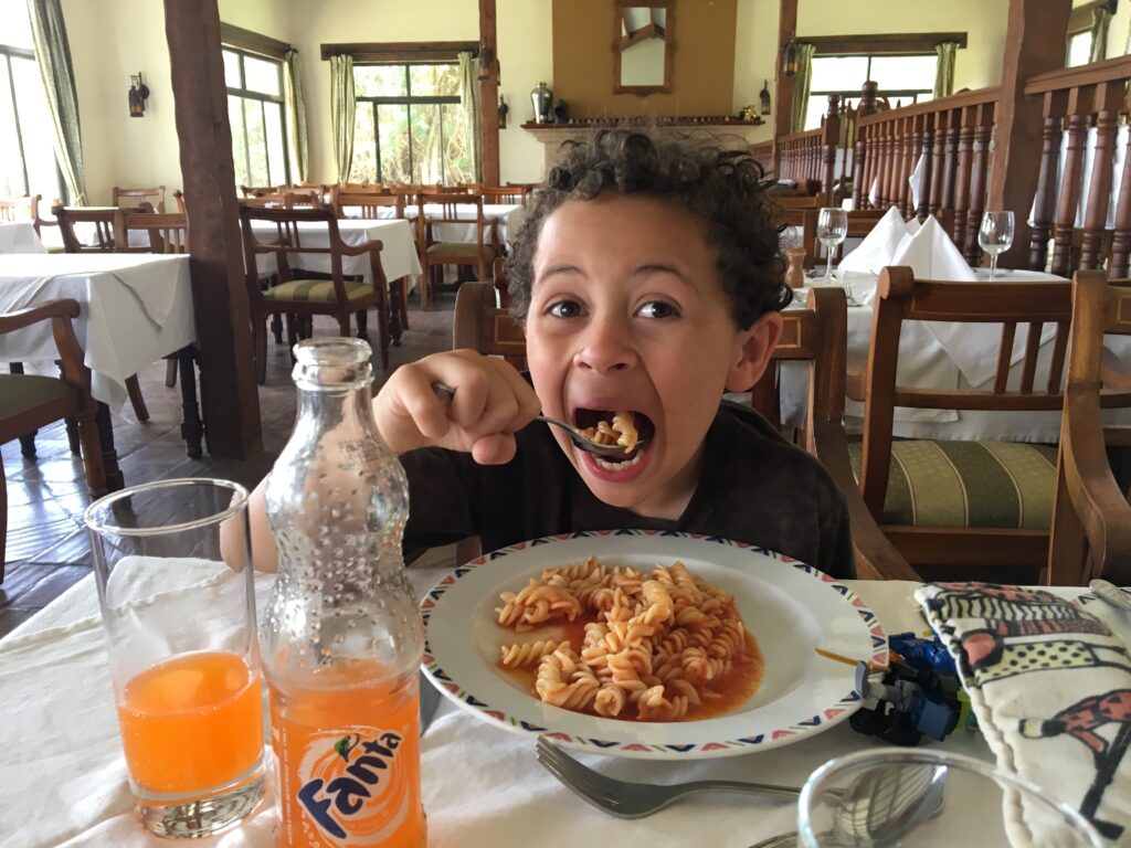 Matthew Jr eating a big meal Sweetwaters Tented Camp Ol Pejeta Kenya